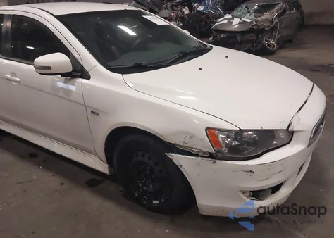 2015 Mitsubishi Lancer Es from USA, damaged, VIN JA32U2FU5FU000482